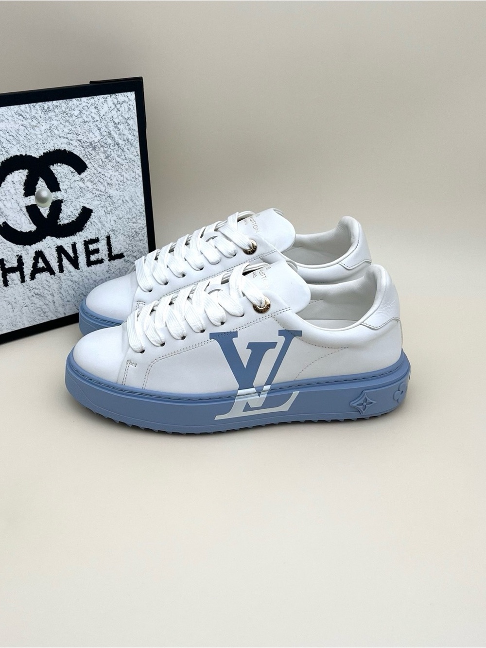Louis Vuitton White Sneakers with Light Blue Sole and LV Logo